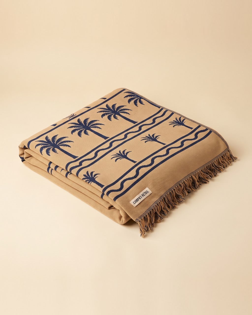 Nile Palms Throw Blanket in Sandstone